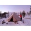sibley_400_pro_winter_snow_stove_firewood_man_1.jpg
